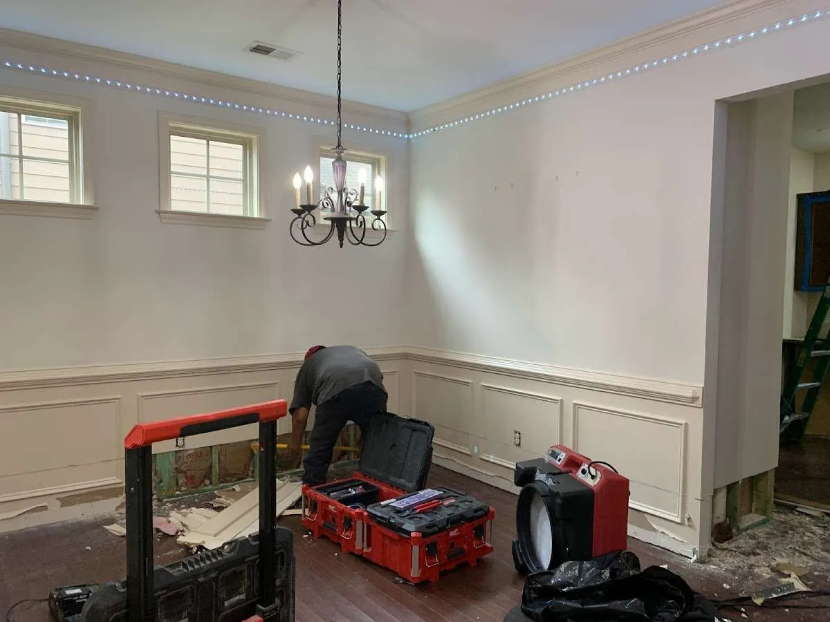 Restoration technician with professional equipment in Norwell